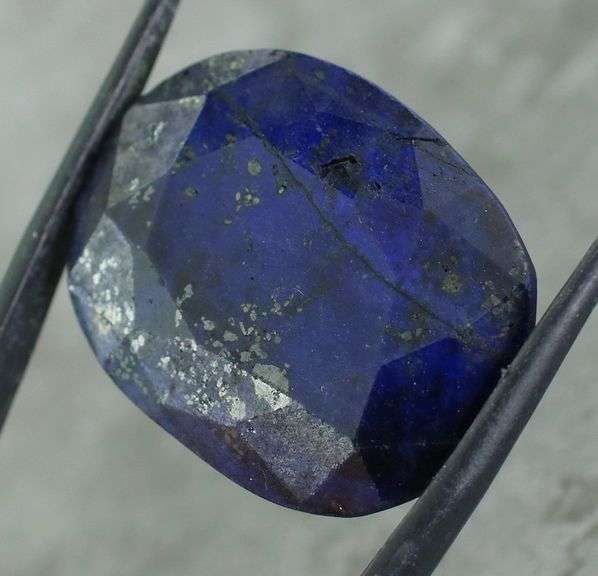 Lavish 70.64ct oval cut ink blue Sapphire