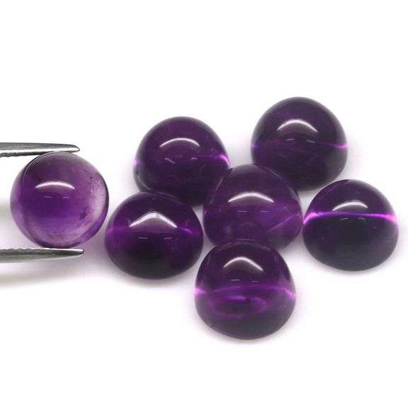 Heavy 34.83ct collection of deep violet Amethyst cabochons