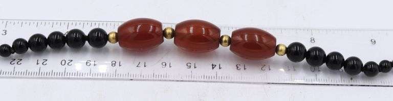 Set of black onyx and amber necklace with bracelet and dangle earrings