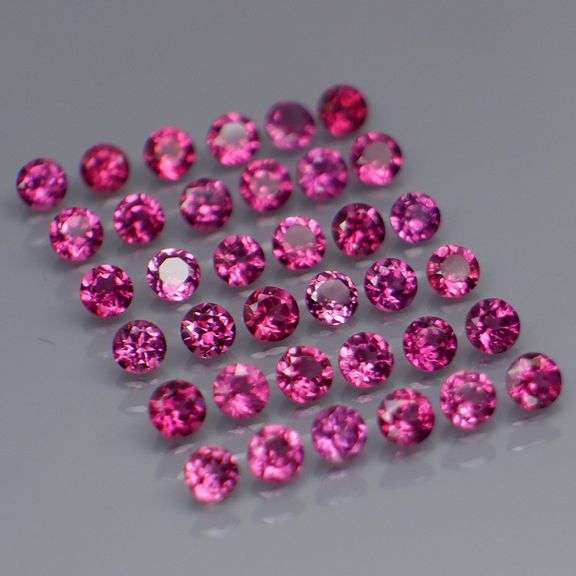 Diamond cut 5.50ct violet pink Rhodolite Garnet set
