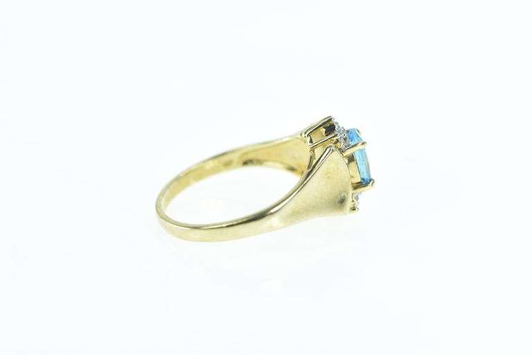 10K Yellow Gold Oval Blue Topaz Diamond Accent Ring