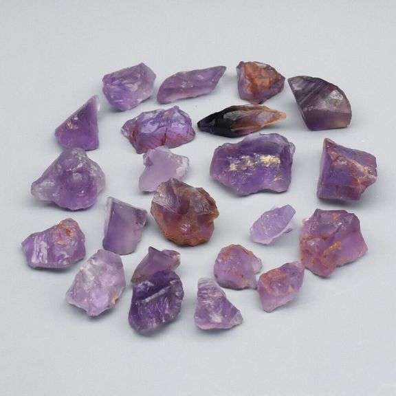 Collectors untreated 82.15ct uncut Amethyst set