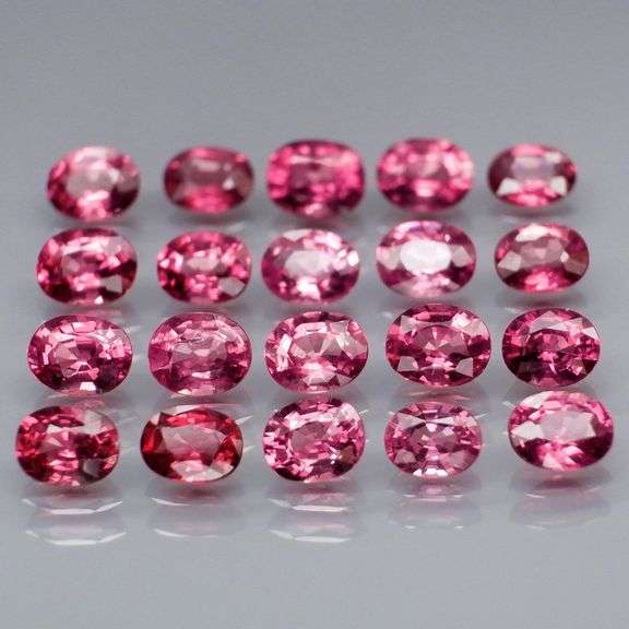 Remarkable 6.44ct reddish pink Rhodolite Garnet set