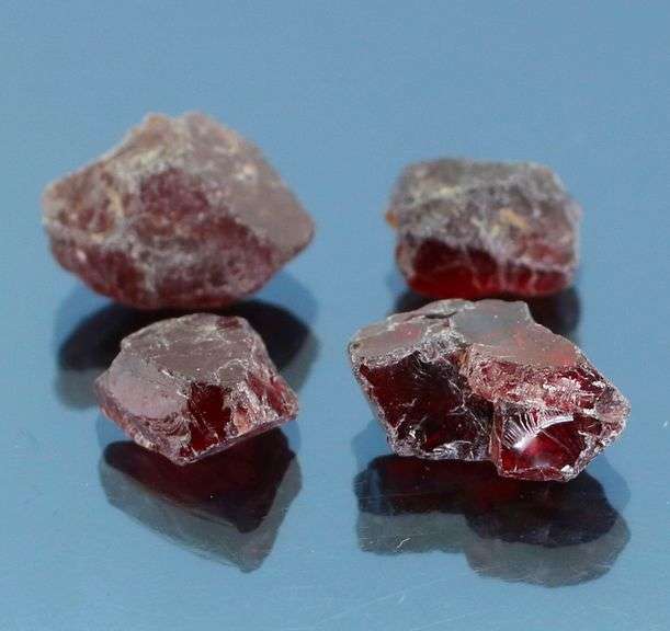Enchanting 27.25ct untreated uncut Rhodolite Garnet set