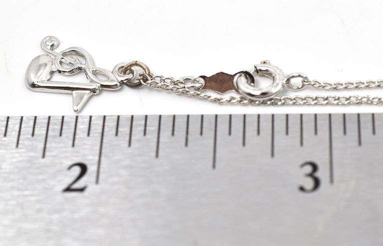 Music Note Pendant Necklace in Sterling Silver