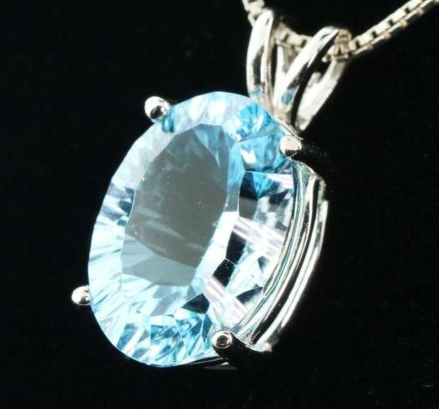 Dazzling high fire concave cut Topaz Pendant