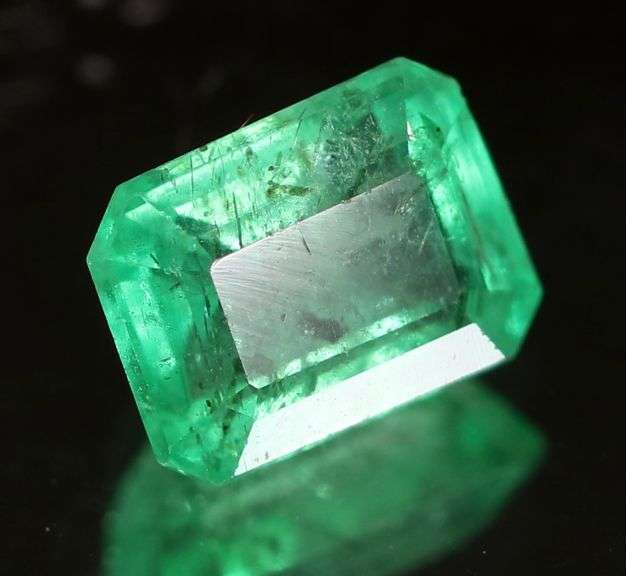 Tremendous color! .79ct vivid green Colombian Emerald