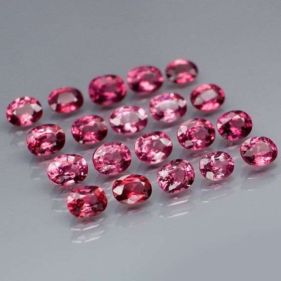Remarkable 6.44ct reddish pink Rhodolite Garnet set