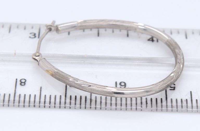 14kt White gold diamond cut hoop earrings