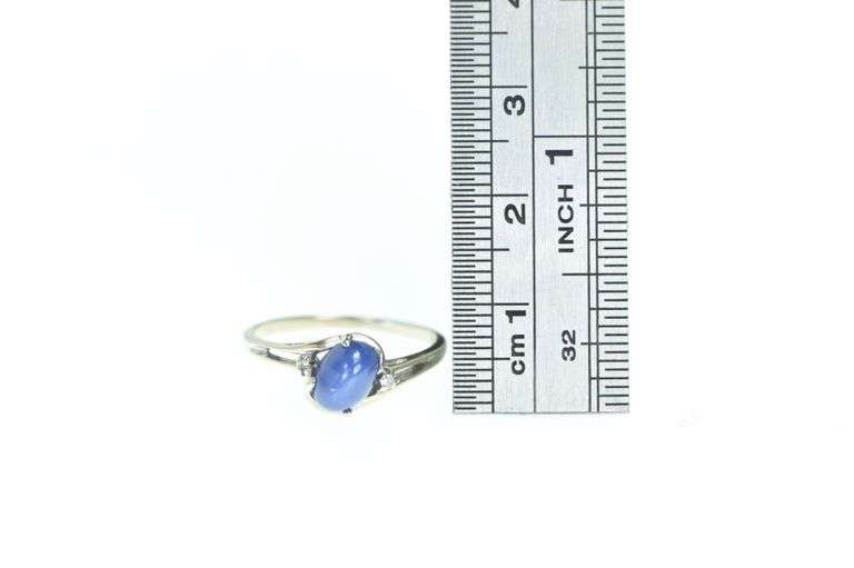 10K White Gold Oval Syn. Star Sapphire Diamond Bypass Ring