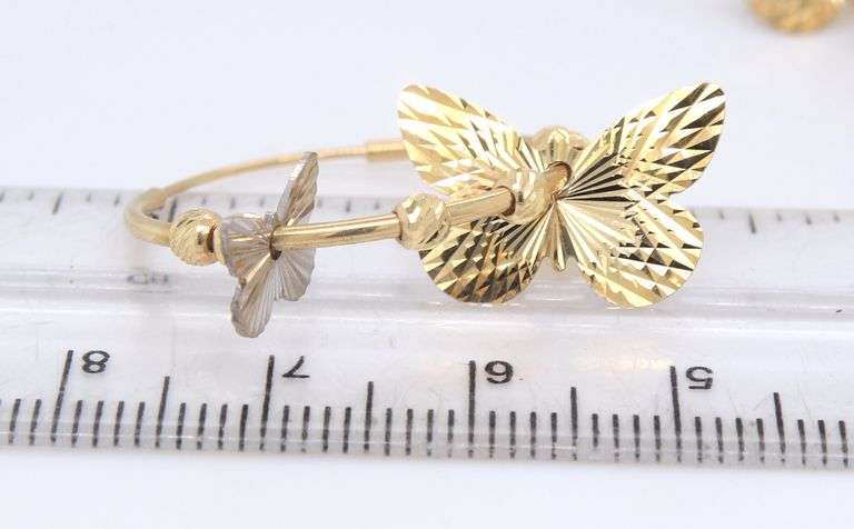 14kt Yellow gold hoop earrings with butterfly charms
