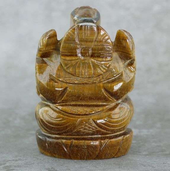 Detailed 477.50ct Tiger Eye carving