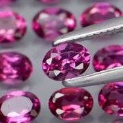Ravishing 5.72ct violet pink Rhodolite Garnet set