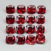 Glorious 6.71ct cushion cut cherry red Garnet set