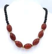 Set of black onyx and amber necklace with bracelet and dangle earrings