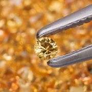 Awesome 3.70ct round cut yellow Sapphire set