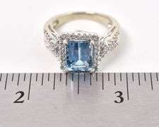 Astounding 14K White Gold Blue Topaz and Diamond Ring