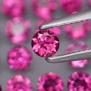 Diamond cut 5.50ct violet pink Rhodolite Garnet set