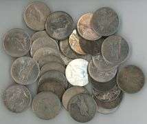 Large lot of 30 assorted Peace Silver Dollars in circ