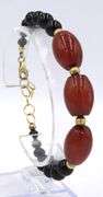 Set of black onyx and amber necklace with bracelet and dangle earrings
