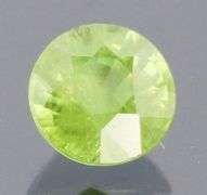 Dazzling .49ct Demantoid Garnet solitaire