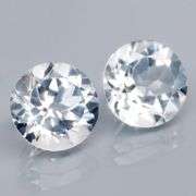 Superb 7.18ct high fire 9mm diamond white Topaz pair