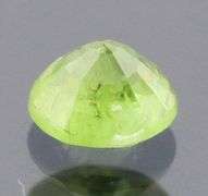 Dazzling .49ct Demantoid Garnet solitaire