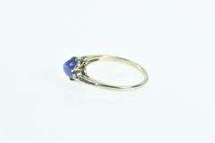 10K White Gold Oval Syn. Star Sapphire Diamond Bypass Ring