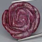 Captivating 47.92ct hand carved Ruby