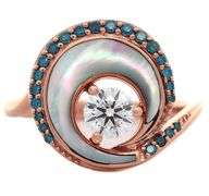 Na Hoku 0.70ctw White and Irradiated Blue Diamond with Mother of Pearl Wave Ring in 14K