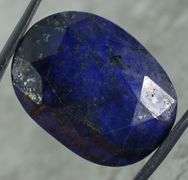 Lavish 70.64ct oval cut ink blue Sapphire