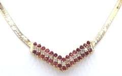 Set of 14kt Yellow gold diamond and ruby necklace, bracelet, ring and matching earrings