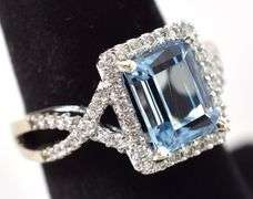 Astounding 14K White Gold Blue Topaz and Diamond Ring
