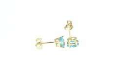 14K Yellow Gold Oval Faceted Blue Topaz Solitaire Stud Earrings