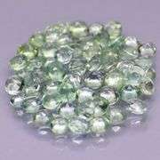 Heated only! 5.43ct round cut green Sapphire set