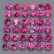 Diamond cut 5.50ct violet pink Rhodolite Garnet set