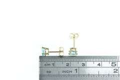 14K Yellow Gold Oval Faceted Blue Topaz Solitaire Stud Earrings