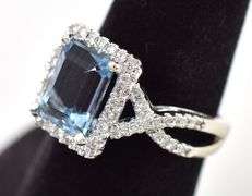 Astounding 14K White Gold Blue Topaz and Diamond Ring