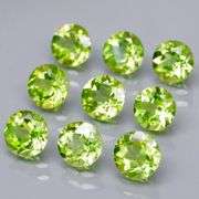Dazzling 4.91ct untreated apple green Peridot set