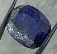 Lavish 70.64ct oval cut ink blue Sapphire