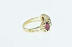 14K Yellow Gold Ornate Three Stone Oval Garnet Ring