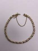 5.3g 10k Yellow Gold XO Diamond Bracelet 7"