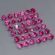 Diamond cut 5.50ct violet pink Rhodolite Garnet set