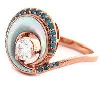 Na Hoku 0.70ctw White and Irradiated Blue Diamond with Mother of Pearl Wave Ring in 14K