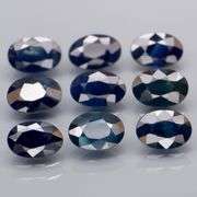 Heated Only! 4.61ct midnight blue Sapphire set