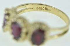 14K Yellow Gold Ornate Three Stone Oval Garnet Ring