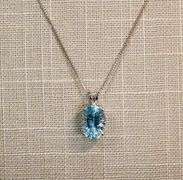 Dazzling high fire concave cut Topaz Pendant