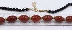 Set of black onyx and amber necklace with bracelet and dangle earrings