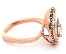 Na Hoku 0.70ctw White and Irradiated Blue Diamond with Mother of Pearl Wave Ring in 14K