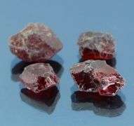 Enchanting 27.25ct untreated uncut Rhodolite Garnet set